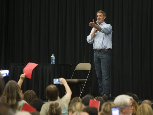 Sen. Jeff Flake answers questions during a town hall
