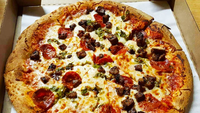 Build-your-own pizza topped with pepperoni, meatballs and green chile ($9.50-$11.50) from Pastaggio's Italian by Lorenzo.