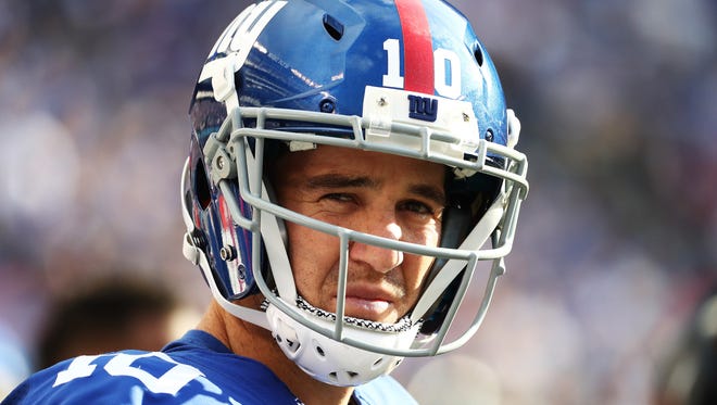 Eli Manning #10 of the New York Giants looks on against the Baltimore Ravens during their game at MetLife Stadium on October 16, 2016 in East Rutherford, New Jersey.