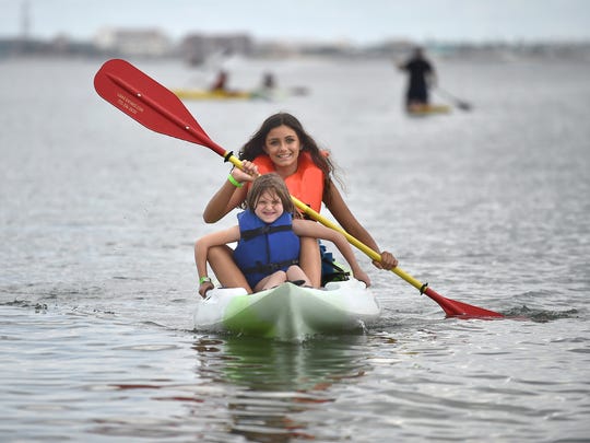 Waterfest is 10 a.m. to 4 p.m. Sunday at Jaycee Park in Fort Pierce on South Hutchinson Island. Last year, Rylie Cox (front), 5, and her cousin Jailyn Lopez, 12, both of Port St. Lucie, tried out a kayak for the first time in the Indian River Lagoon during Waterfest.