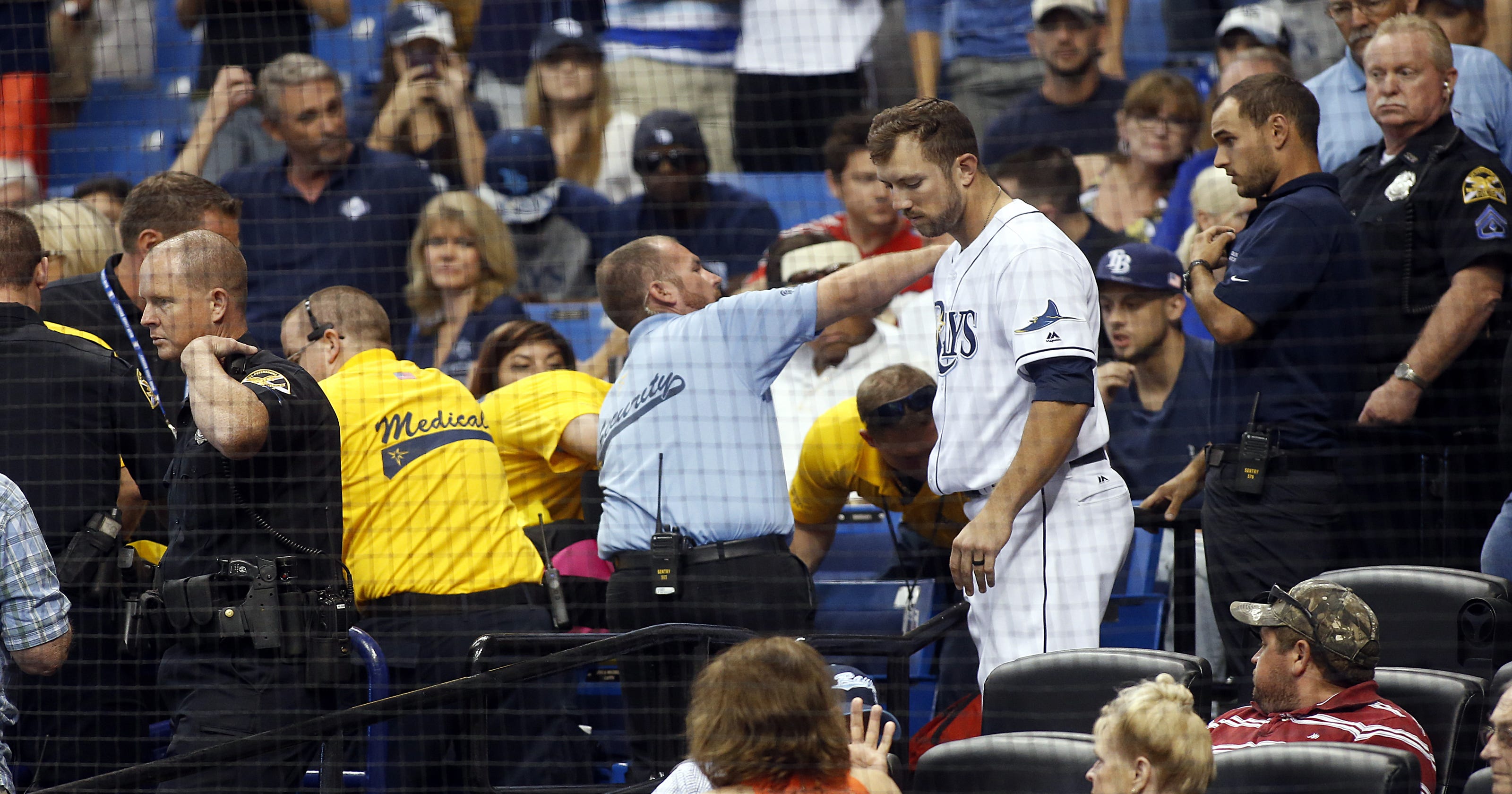 Baseball fan hit by foul ball, taken off on stretcher at Rays game