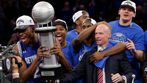 Seton Hall head coach Kevin Willard, right, guided the Pirates to the Big East Tournament title.