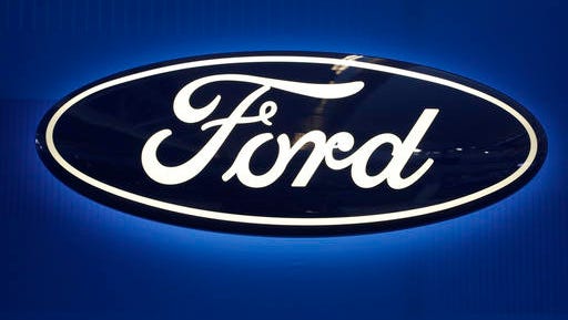This Feb. 11, 2016, photo shows the Ford logo on display at the Pittsburgh International Auto Show in Pittsburgh.