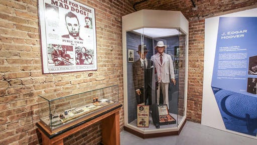FILE - I nthis March 3, 2015 file photo, clothing belonging to F.B.I Director J. Edgar Hoover and F.B.I agent Melvin Purvis in charge of the John Dillinger manhunt are on display in Crown Point, Ind., on March 3, 2015.    The John Dillinger Museum has seen more visitors since moving from Hammond to Crown Point. The museum saw nearly 26,500 visitors during its time in Hammond, including a high number of more than 5,500 visitors in 2013. So far in 2016, there have been more than 6,800 visitors to the museum in Crown Point, and nearly 10,800 from its grand opening to its one-year anniversary.  (Michelle Pemberton/The Indianapolis Star via AP)