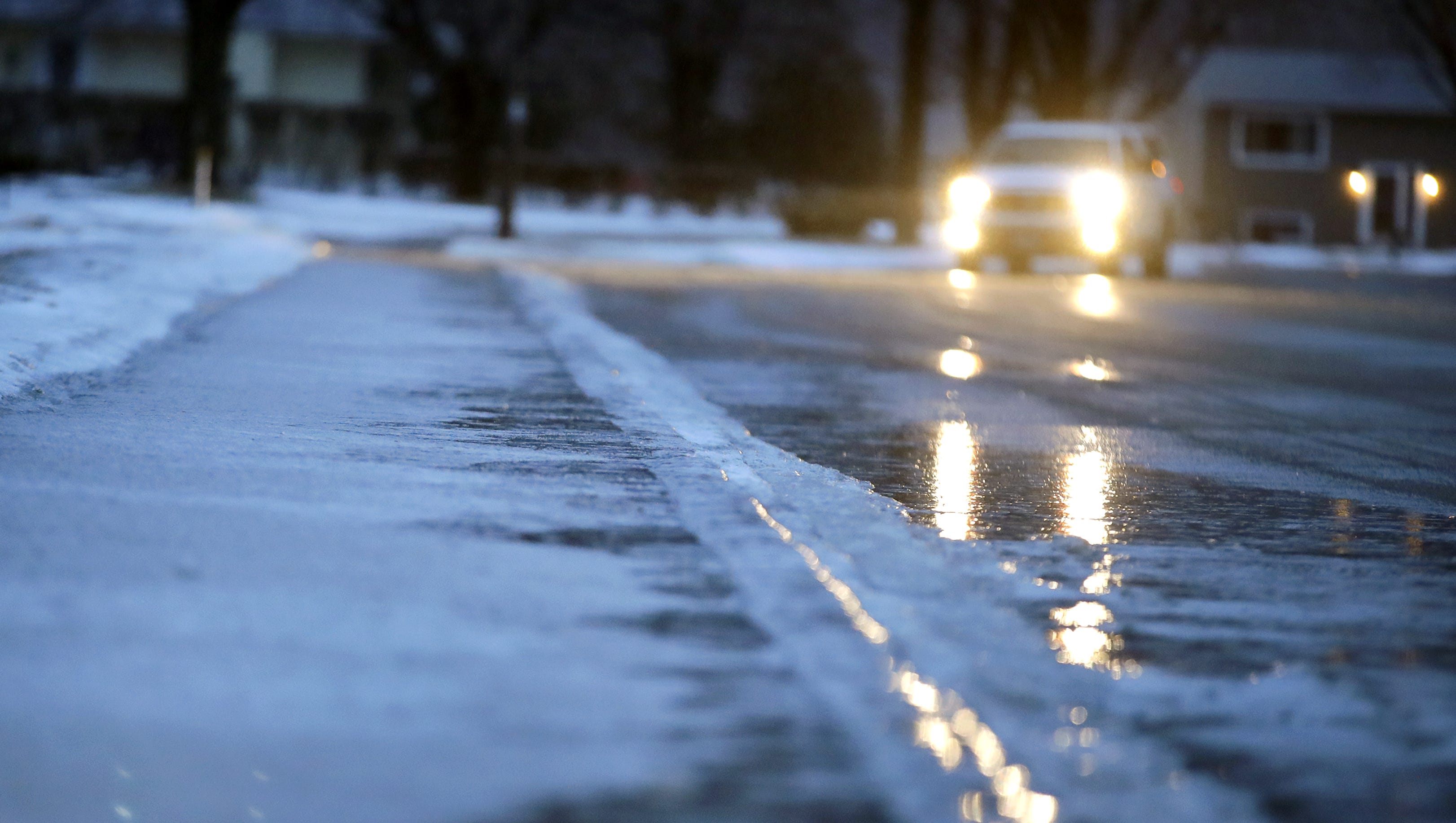 Freezing downpour covers Wisconsin roads with ice
