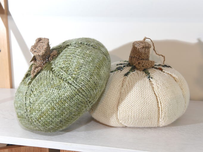 Artist Fran Gross creates hand-knitted pumpkins.