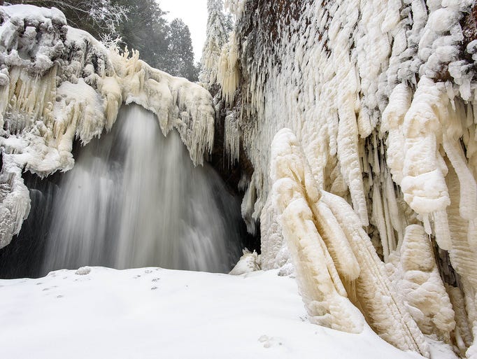 Many shapes of ice form along Miners Falls from water