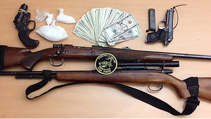 A search conducted Friday resulted in two arrests. $5,200  worth of  confiscated