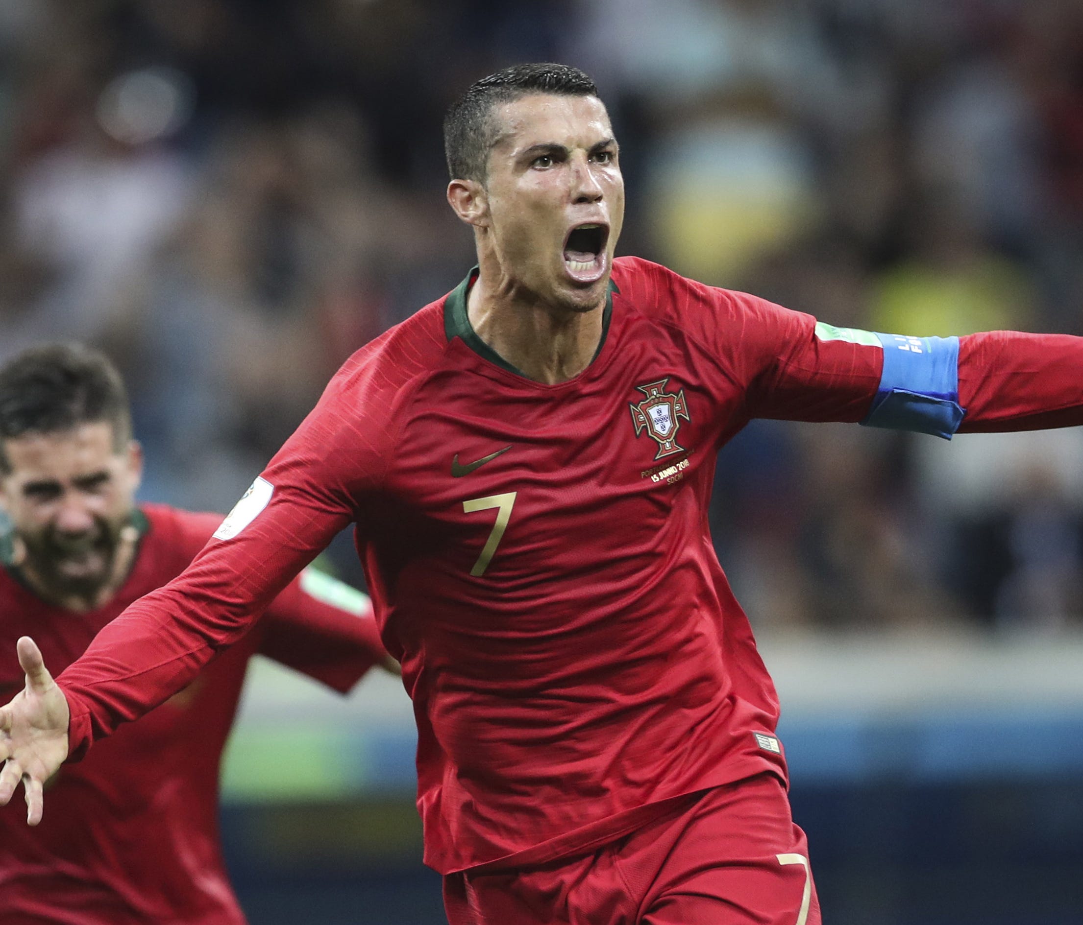 Cristiano Ronaldo celebrates a goal against Spain in the World Cup group stage.