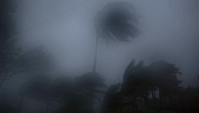 The high winds and rain of Hurricane Matthew roar over Baracoa, Cuba, Tuesday, Oct. 4, 2016. The dangerous Category 4 storm blew ashore around dawn in Haiti. It unloaded heavy rain as it swirled on toward a lightly populated part of Cuba and the Bahamas.