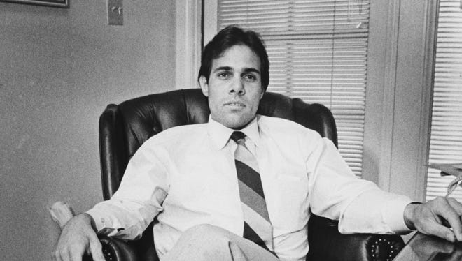 In this 1986 file photo, former Arizona millionaire Gordon Hall sits in his office. Hall, who once boasted he would become a trillionaire in real-estate and other dealings, was sentenced to 96 months in federal prison over a tax scam.