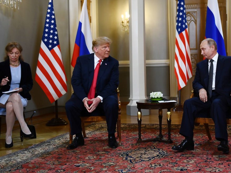 Russian President Vladimir Putin (R) and US President