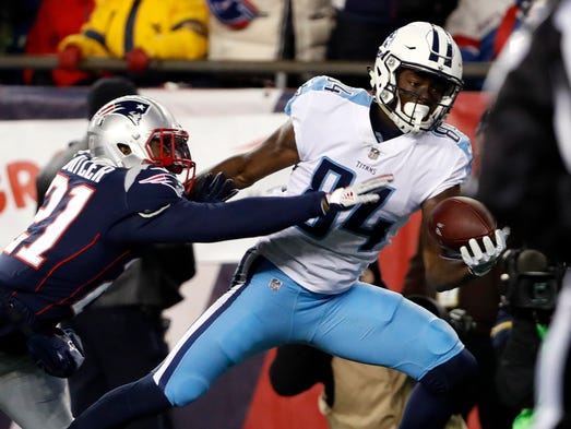 Titans receiver Corey Davis (84) hauls in a one-handed