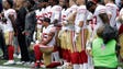 San Francisco 49ers strong safety Eric Reid kneels