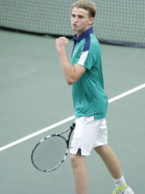 Notre Dame's Charlie Parish celebrates a point during the WIAA Division 2 doubles state championship match in Madison on Saturday. Parish and Isaac Hingtgen secured the title with a three-set victory.