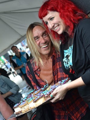 Iggy Pop with Lauren Reskin, owner of Sweat Records in Miami, on Record Store Day 2012, which also was Iggy’s birthday. He was presented with a birthday cake.