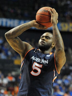 Mar 13, 2015; Nashville, TN, USA; Auburn Tigers forward Cinmeon Bowers (5) shoots from the free throw line during the first half of the third round against LSU Tigers of the SEC Conference Tournament at Bridgestone Arena. Mandatory Credit: Jim Brown-USA TODAY Sports