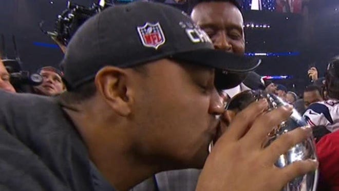 Yeah, that's Michael Floyd kissing the Lombardi Trophy.