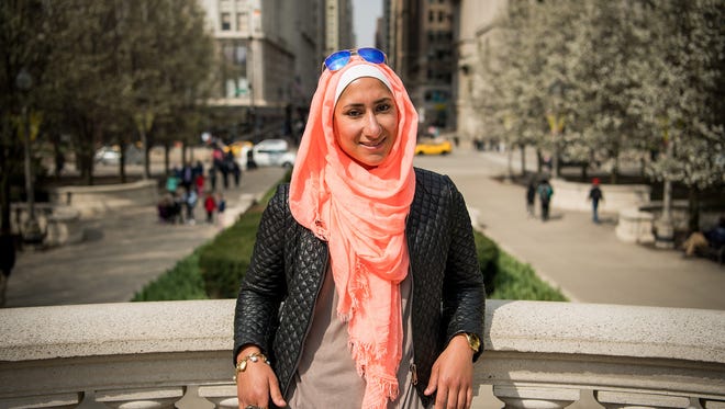Runna Othman, 26, of Chicago, poses April 14, 2017, for a portrait at Millennium Park in Chicago. She recently wrote a blog post for MuslimGirl.com about how Donald Trump affected her faith.