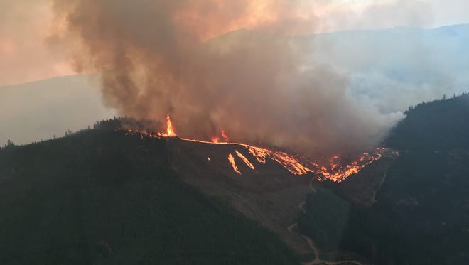 The Horse Prairie Fire, photographed Saturday, Aug. 26, 2017, is burning in southern Oregon near Riddle. The fire reached around 450 acres by early Sunday.