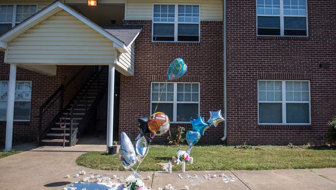 Memorials for homicide victims Troy A. Whitmore II, 19, of Humboldt, and Deairrious D. Young, 20, of Milan, are seen Thursday, September 28, 2017, at the Meadows Apartment Complex off Cantrell Street in Milan, Tenn.