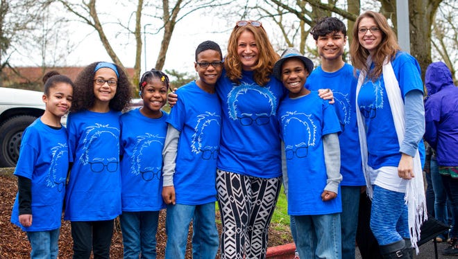 This March 20, 2016 photo shows the Hart family of Woodland, Wash. at a Bernie Sanders rally in Vancouver, Wash. Authorities in Northern California say they believe all six children from the family were in a vehicle that plunged off a coastal cliff.