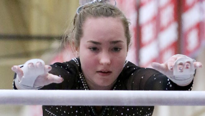 Franklin/Oak Creek/Whitnall/Muskego's Lydia Anderson competes in uneven bars during a quad meet at Arrowhead on Feb. 1.