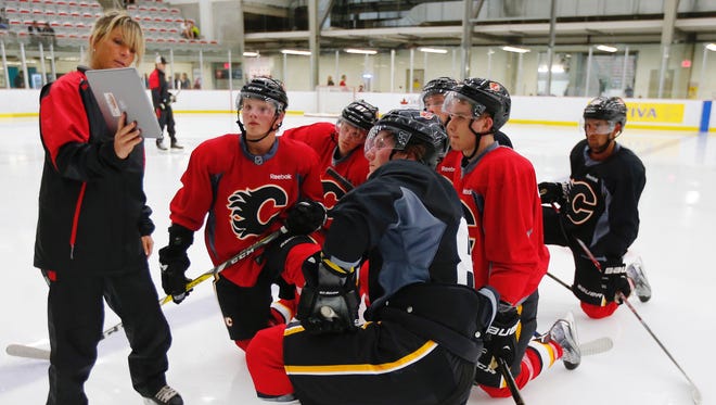 Skating coach Dawn Braid works at the Calgary Flames development camp in Calgary, Alta., on Tuesday, July 5, 2016.