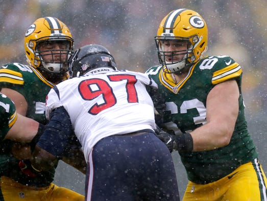 Green Bay Packers guard Jason Spriggs (78) and center