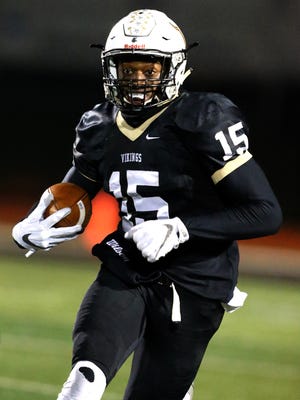 South Brunswick's Justin Shorter runs for yardage in the first half against Old Bridge during their Central Group V semifinal on Friday, Nov. 17, 2017.