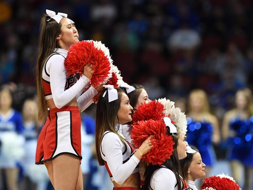 North Carolina State cheerleaders perform during the