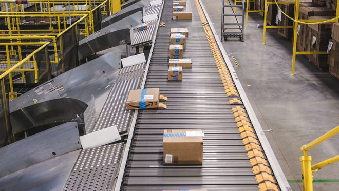 Amazon rolling out machines to automate packing orders