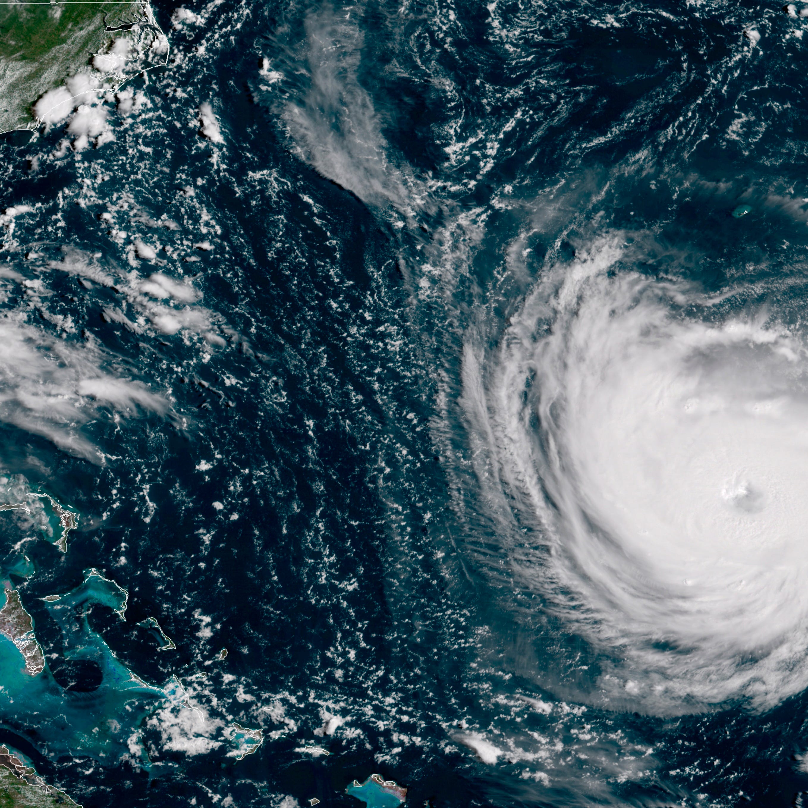 This GOES East satellite image taken Tuesday, Sept. 11, 2018, at 10:30 a.m. EDT, and provided by NOAA shows Hurricane Florence in the Atlantic Ocean as it threatens the U.S. East Coast, including Florida, Georgia, South and North Carolina. Millions o
