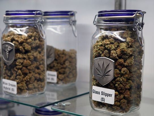 Glass jars of marijuana offered for sale at the Medicine