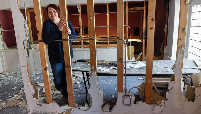 Donella Westphal, owner of Jules' Bistro, shows the space they will be expanding into Monday, June 4, next to the existing location along West St. Germain Street.