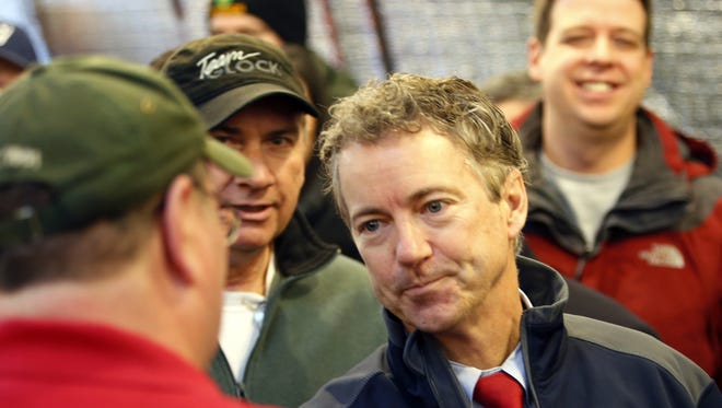U.S. Sen. Rand Paul, R-Ky., meets with members of the Londonderry Fish and Game Club, Wednesday, Jan. 14, 2015, in Litchfield, N.H. Paul is a possible Republican presidential candidate. (AP Photo/Jim Cole)