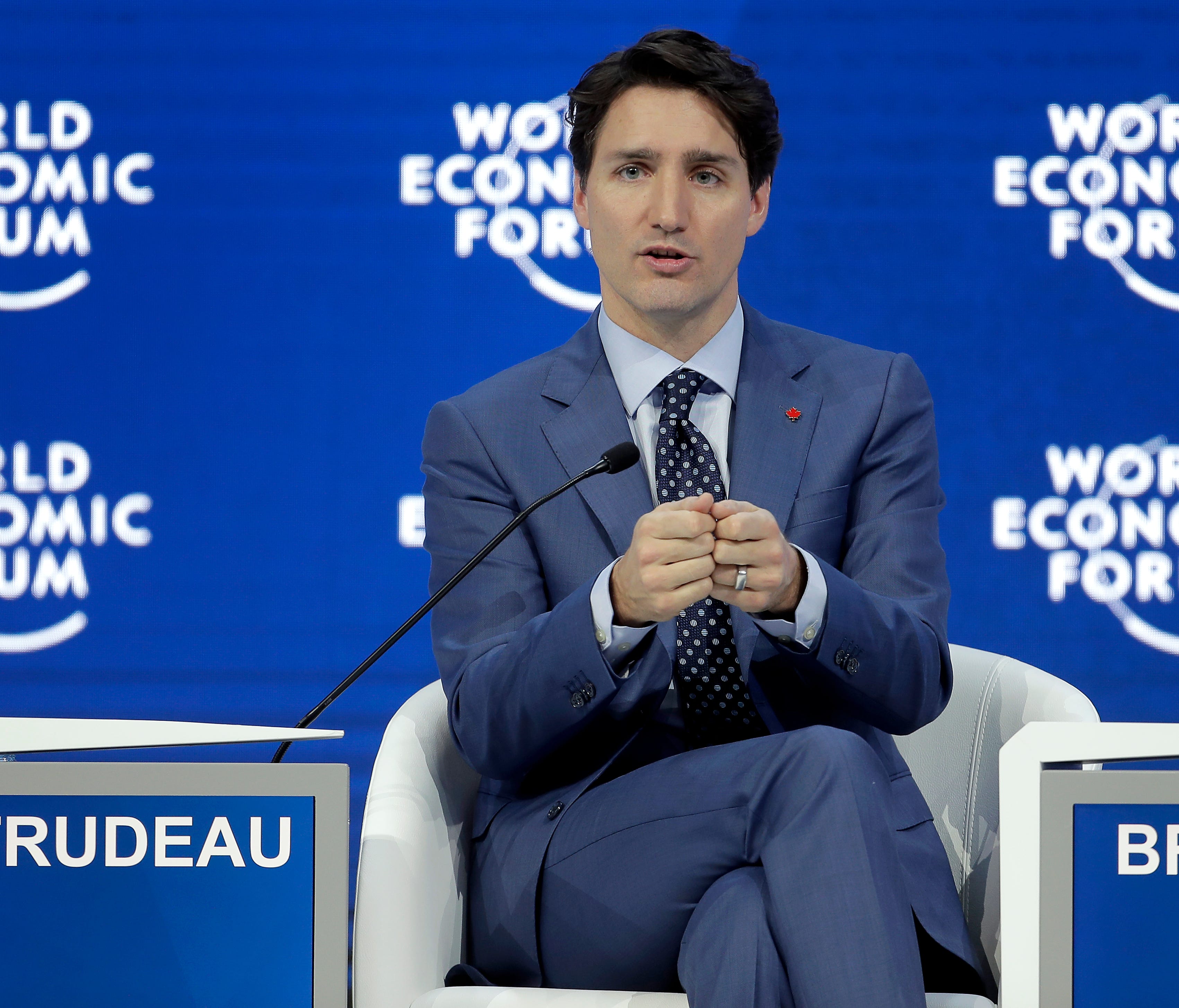 Justin Trudeau, Prime Minister of Canada, gestures during a conversation on corporate responsibility and the role of women in a changing world during the annual meeting of the World Economic Forum in Davos, Switzerland, on Jan. 23, 2018.
