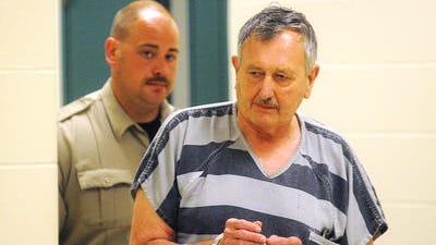 Allan Dean Hansen, 72, is escorted into Minnehaha County Court on Wednesday, Sept. 3, 2014, in Sioux Falls, S.D.