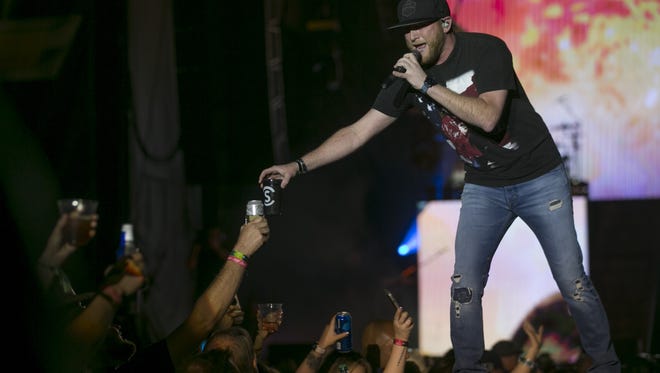 Cole Swindell performs on the main stage on Day 1 of Country Thunder Arizona on Thursday, April 5, 2018, in Florence.