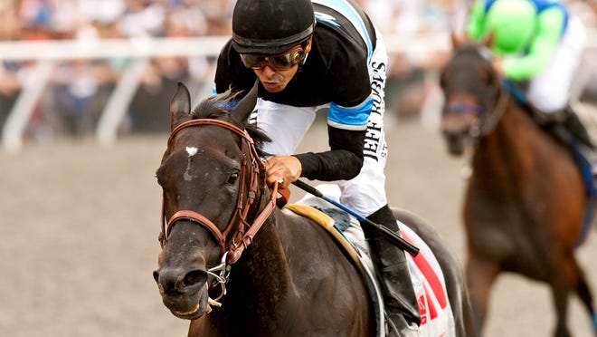 
Shared Belief and jockey Mike Smith win the Grade I, $1,000,000 TVG Pacific Classic Sunday, August 24, 2014 at Del Mar Thoroughbred Club.
