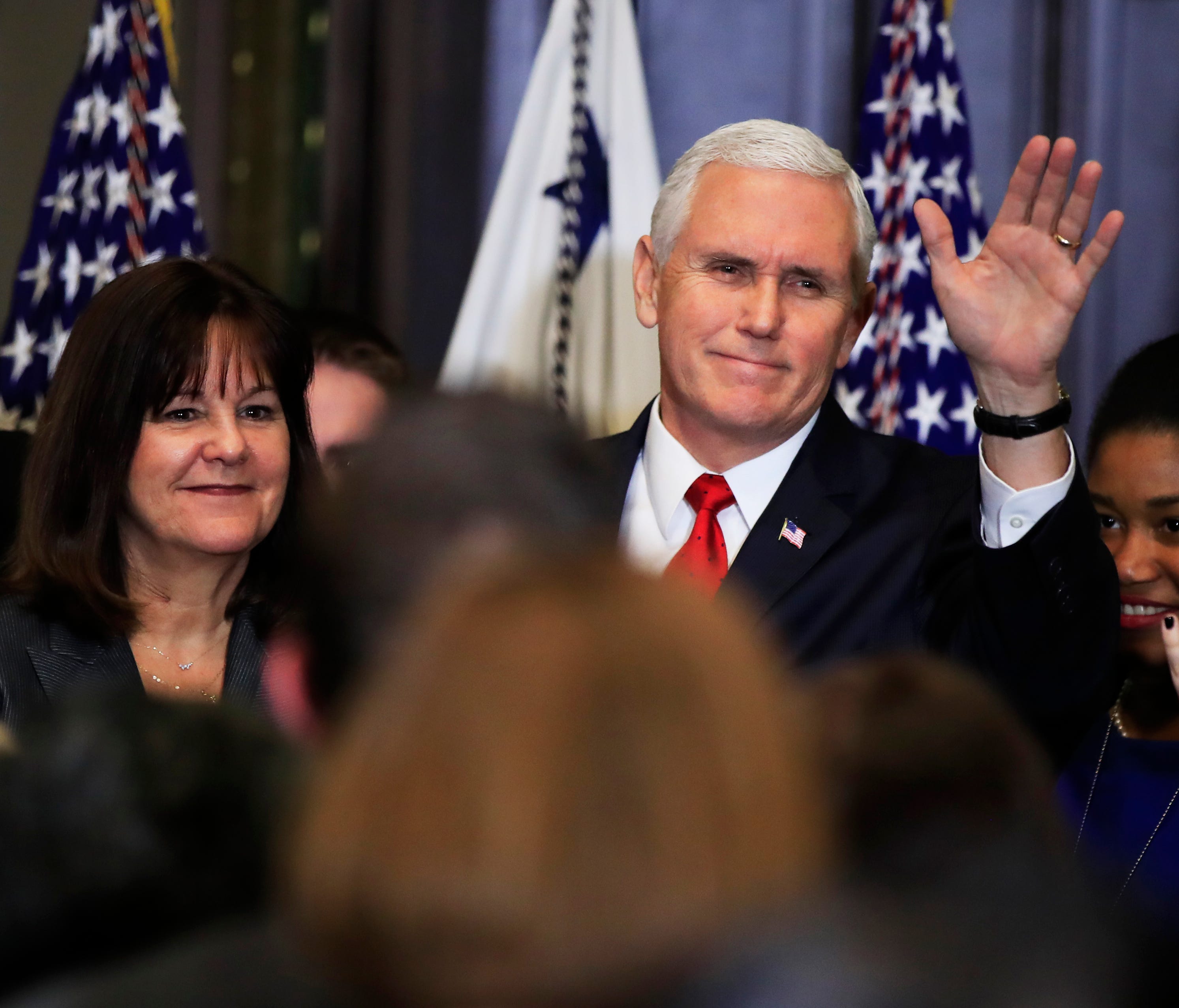 Vice President Pence with his wife Karen Pence, waves to anti-abortion supporters and participants of the annual March for Life event, during a reception in the Indian Treaty Room at the Eisenhower Executive Office Building  Thursday.