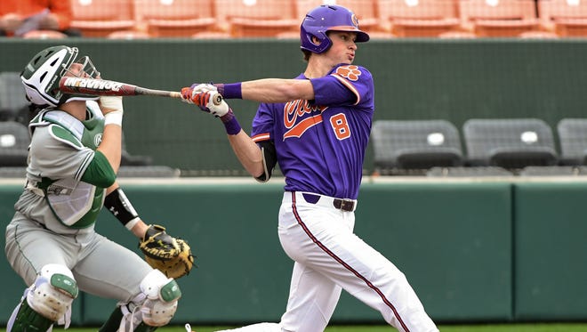 Clemson sophomore shortstop Logan Davidson (8) swings against William and Mary during the bottom of the second inning on Saturday at Doug Kingsmore Stadium in Clemson.