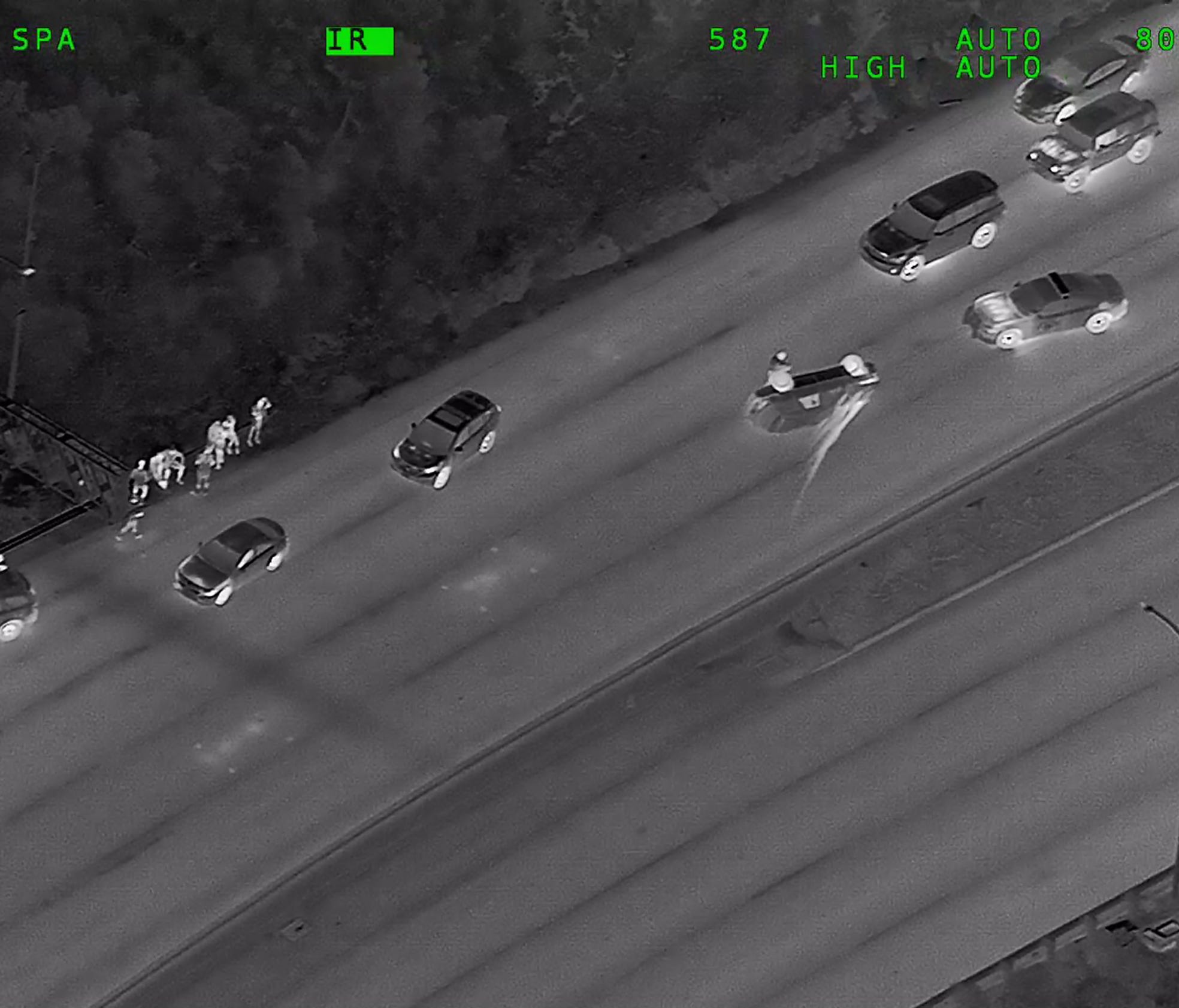 This image using forward-looking infrared technology from the California HIghway Patrol shows an overturned SUV May 26, 2018, in the southbound lanes of U.S. 101 in Sausalito, California. Highway Patrol officers and Sausalito police later found the d