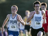 Cedar Crest's Jesse Cruise fights past Cocalico's Evan Kreider to finish 12th and help the Falcons finish third as a team.