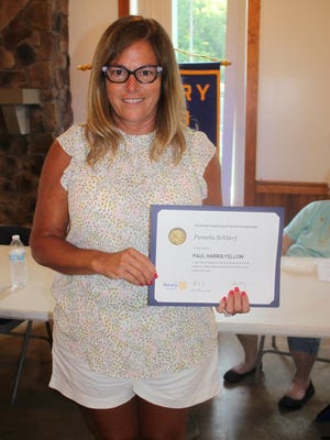 Victor-Farmington Rotarian Pam Rosbrook-Schlierg is named a Paul Harris Fellow.