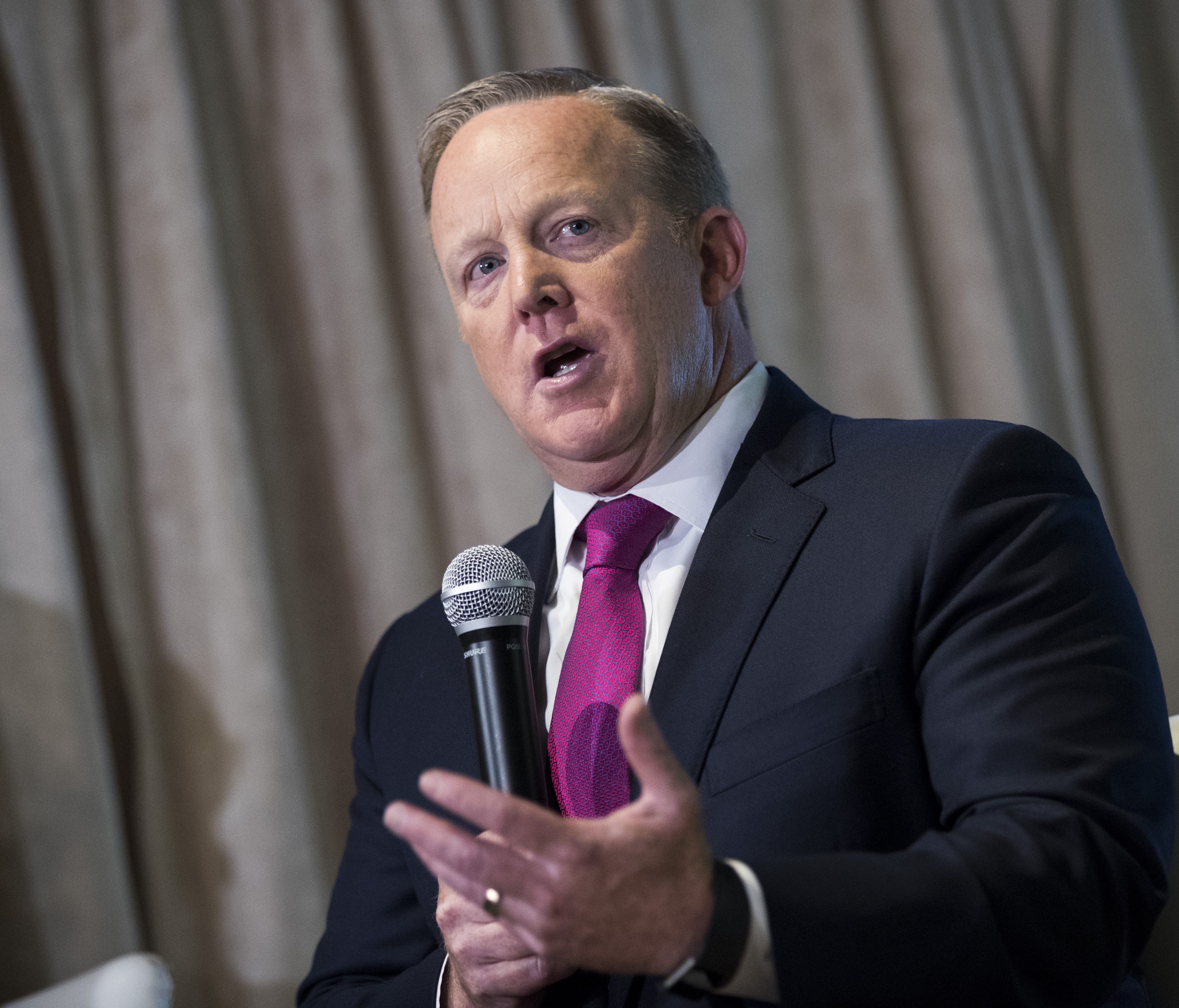 Former White House press secretary Sean Spicer answers a few questions from the press at Madame Tussauds wax museum, April 25, 2018 in New York City.