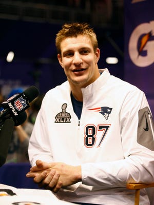 Jan 27, 2015: New England Patriots tight end Rob Gronkowski (87) addressees members of the press during media day for Super Bowl XLIX at US Airways Center.