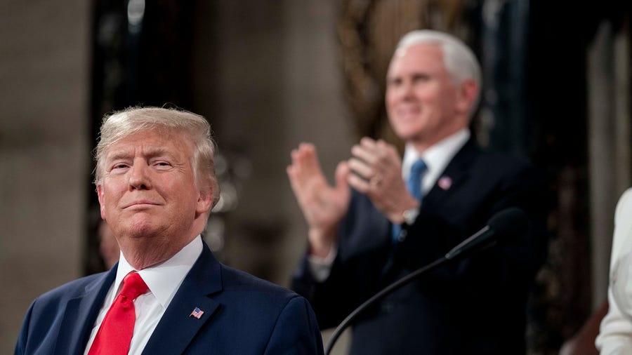 President Trump at the State of the Union address, with VP Mike Pence in the background.