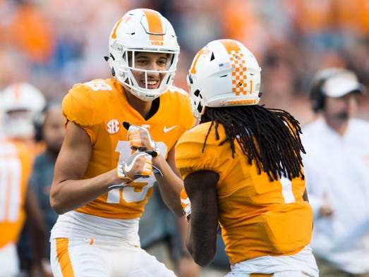 Tennessee wide receiver Jeff George (19) celebrates