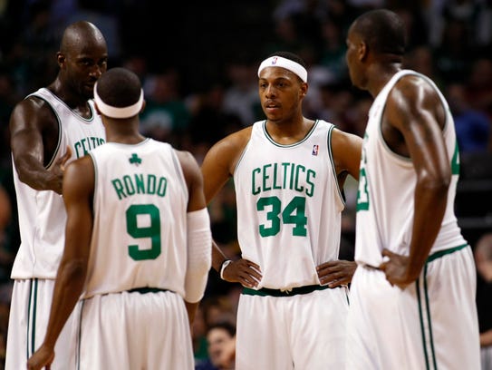 Boston Celtics forward Paul Pierce (34) talks with